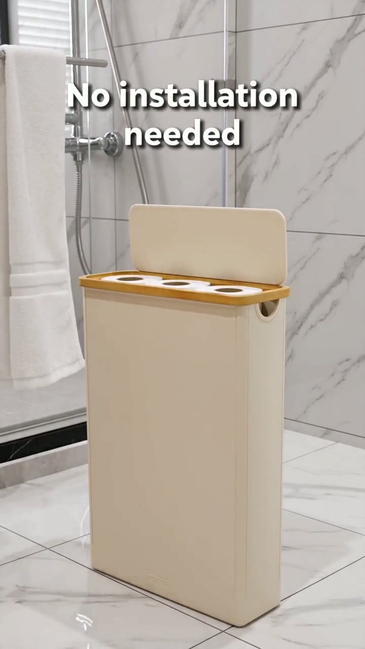 Lid open, holding a full stack of rolls