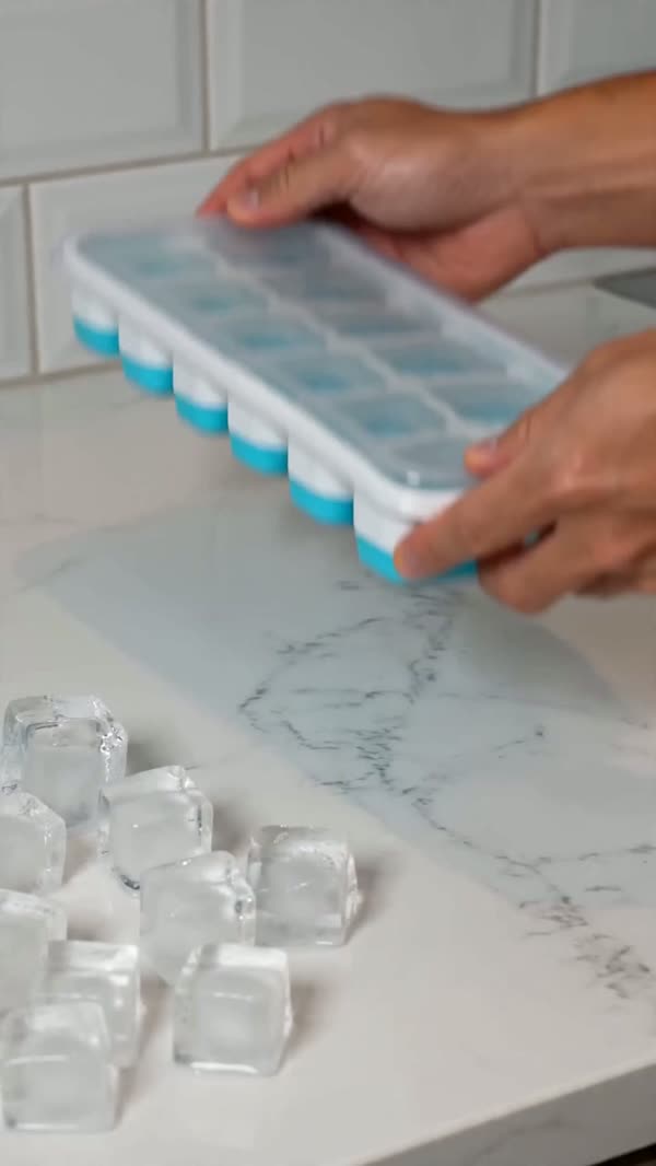 One press from underneath and the cube pops free