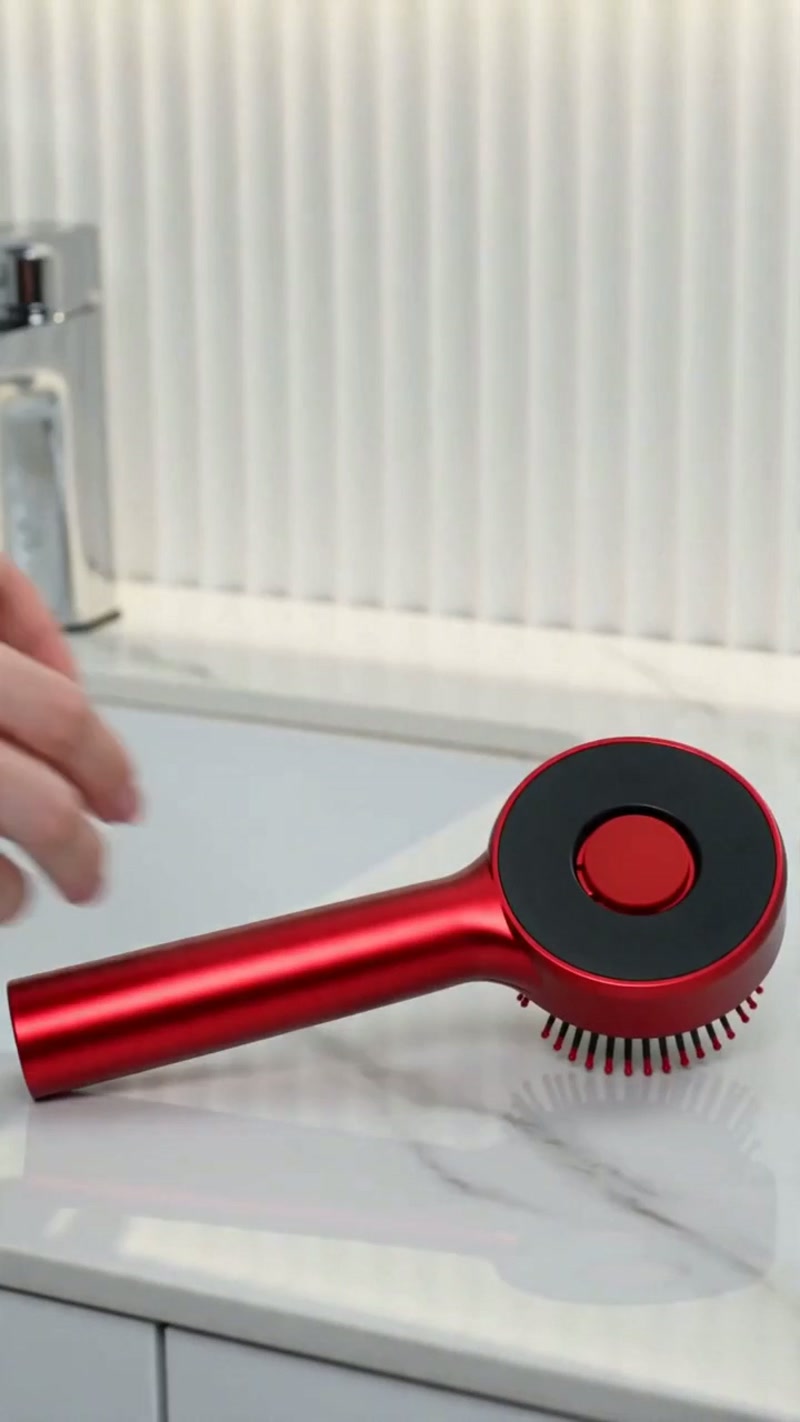 The comb vibrates gently while the built-in reservoir spreads oil evenly